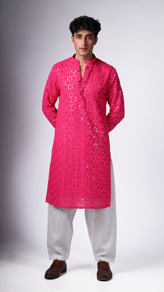 Model in Hot Pink Kurta with Sequin Embellishments by BWO, paired with salwar and tan Oxford shoes