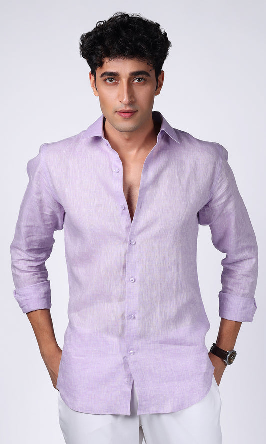 Close-up portrait of a model in a lavender linen shirt, focusing on the detailed craftsmanship